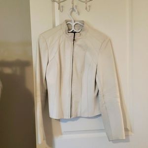 White moto style jacket. Brand is DANIER .Size small
